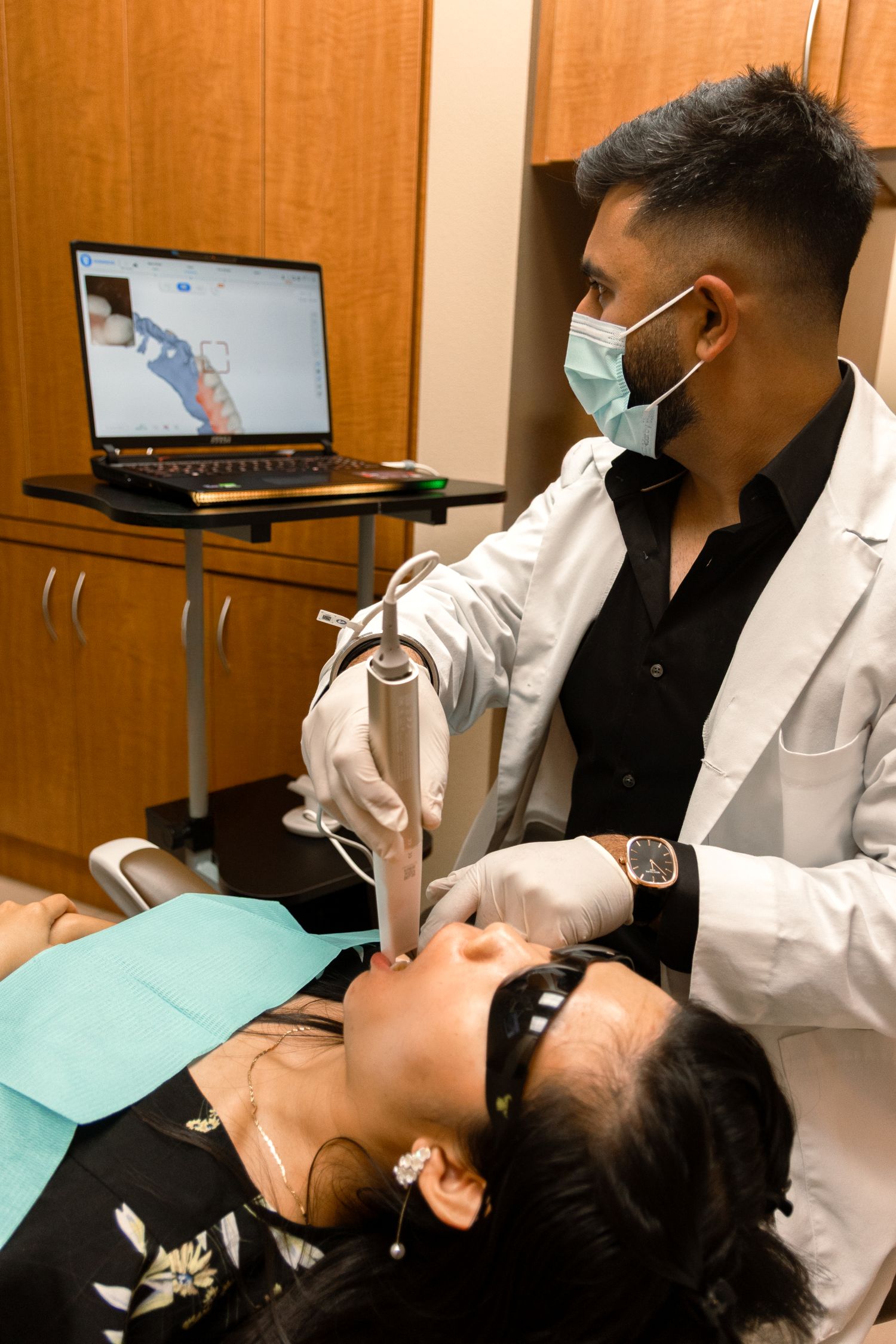 Implant-supported bridge anchored by dental implants instead of natural teeth